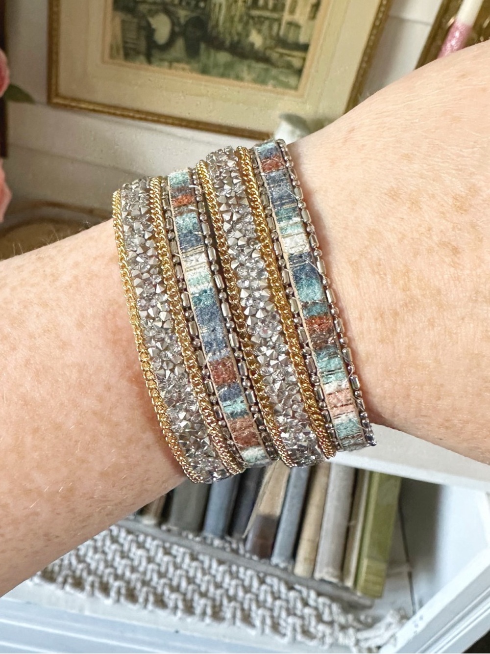 Express multi-strand bracelet features metallic and crystal details